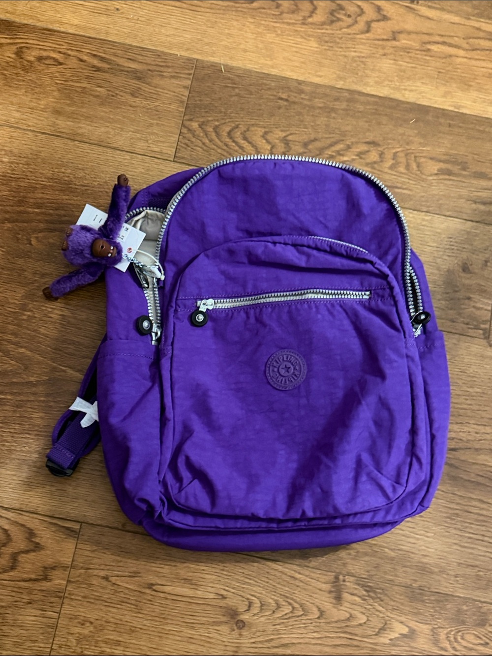 Kipling Vibrant Purple Nylon Daypack with Monkey Keychain